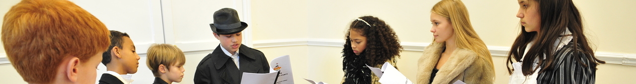 Children Playing a Murder Mystery Party
